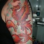 inkin - tatouage phenix sur bras - artkaos tattoo.jpg