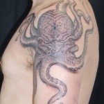 inkin - tatouage pieuvre sur le bras - longino tattoo.jpg