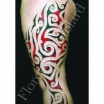 inkin - tatouage tribal en couleurs sur jambe - atelier florence amblard.jpg