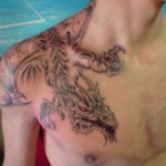 inKin-tatouage-dragon-epaule-torse-FRANI TATTOO.jpg